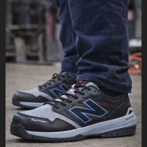 New Balance Black and Gray Shoes with Blue Highlights